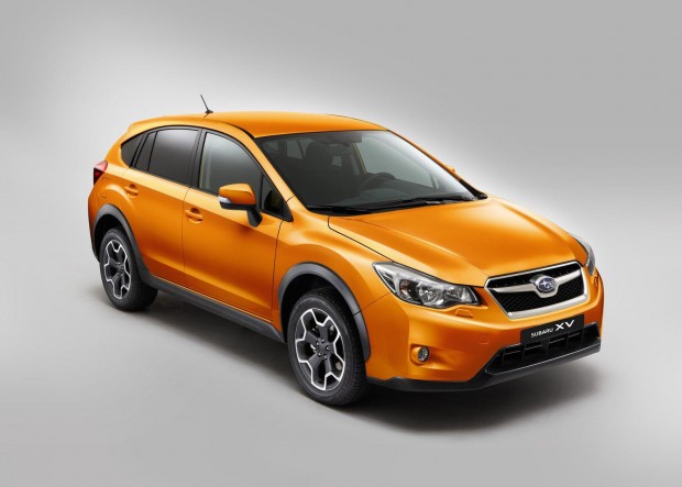 The 2013 Subaru XV Crosstrek looks better in person... with lots of mud on it.