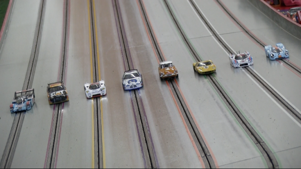 Drifting slot cars like Chris Harris around a race track