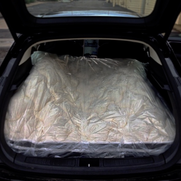 We've crammed a full-size mattress in the back of a Model S, and it worked - sort of.