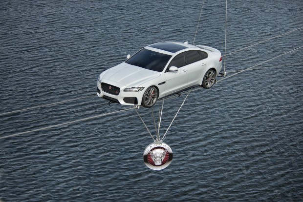2016 jaguar xf on a high wire over a river debut new york auto show